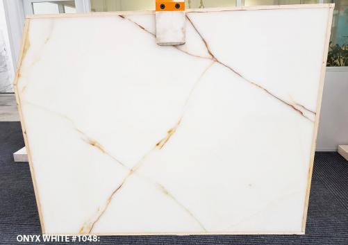 Supply polished slabs 0.8 cm in natural onyx White Onyx 1048. Detail image pictures 